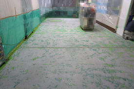 写真：自動車部品工場塗床工事下地処理工事