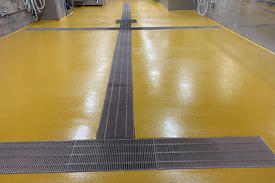 写真：化粧品工場　水系硬質ウレタン樹脂　塗床工事　塗り床工事　床塗装　床改修　施工例　防塵床